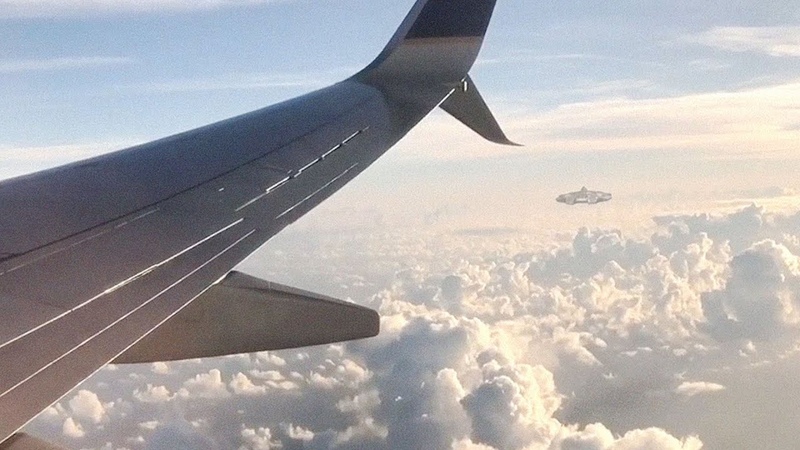 Huge UFO Over Atlantic Ocean Freaking Airplane Passenger (