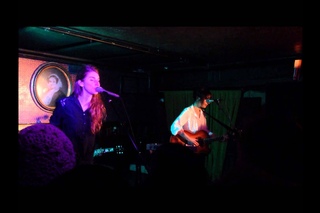Swiss/German singer flustered after realizing crowd is singing along with the band’s lyrics during their first show in the Unite