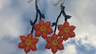 Arete de flores en mostacilla